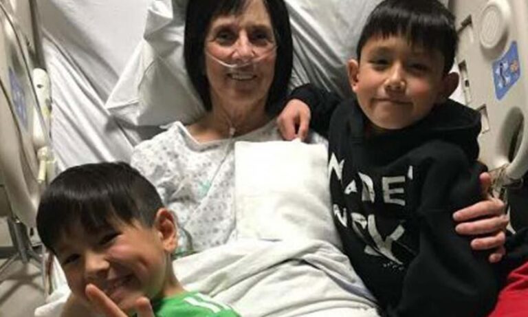 Children performing CPR during emergency to save unconscious family member at home