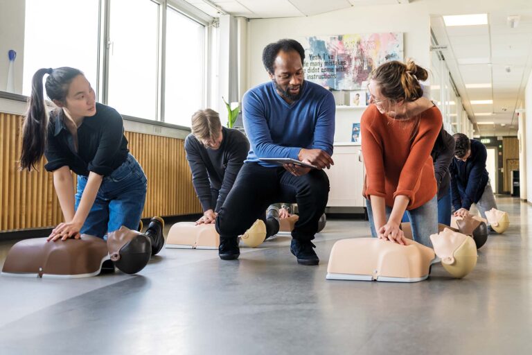 Bystanders performing hands-only CPR and using an AED during a public cardiac arrest emergency