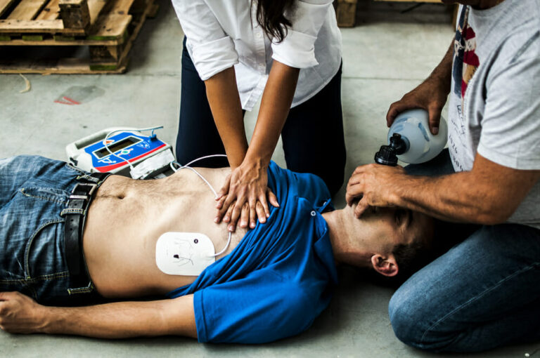 Bystanders and paramedics perform CPR after a woman collapses from cardiac arrest inside a Kingsville restaurant.