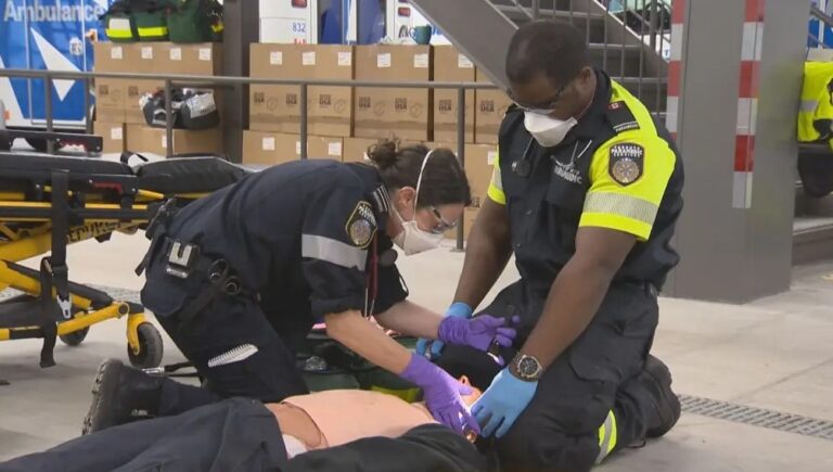 Bystanders provide first aid after a fatal impaired driving crash in Richmond Hill involving multiple vehicles.