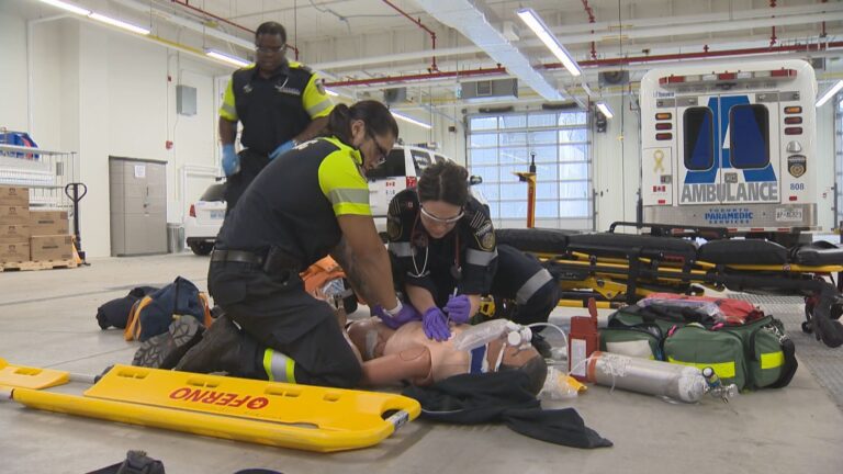 First aid responders assist injured people after gunfire during Toronto Raptors championship parade