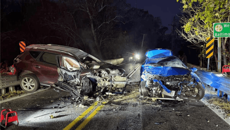 Serious head-on car collision scene highlighting the importance of first aid response
