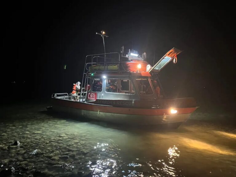 Lake shoreline at night in Quebec showing dangerous low visibility conditions